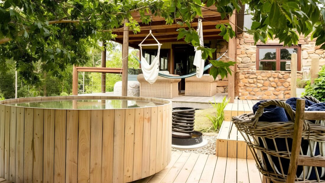 Luxury outdoor living space featuring a Buitengewoon wood-fired hot tub.